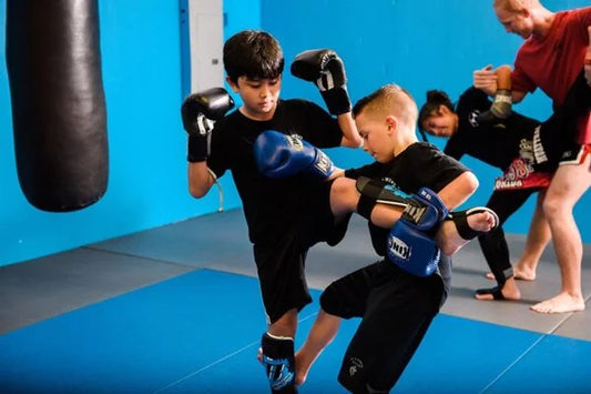 Two kids together Kick Boxing Training